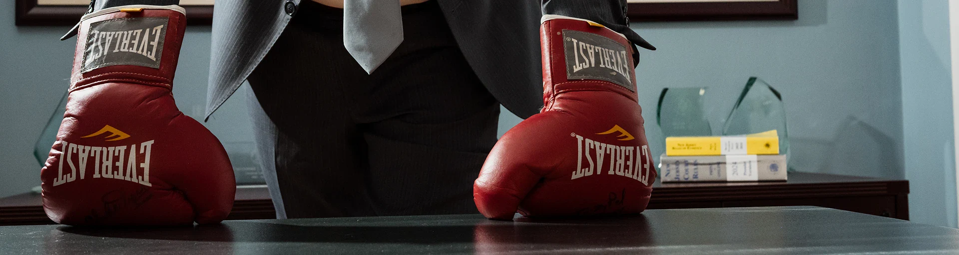 Modern conference room featuring a metal table, black chairs